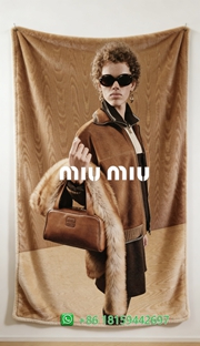 Miumiu Throw Blankets